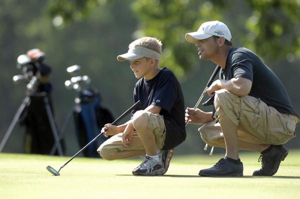 Father and child golf marbella in spain